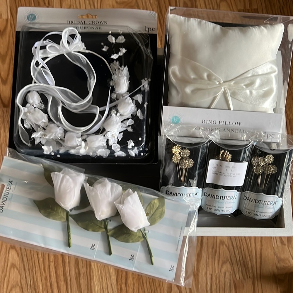 Set of ring pillow, bridal crown, boutonnière, and accent picks.